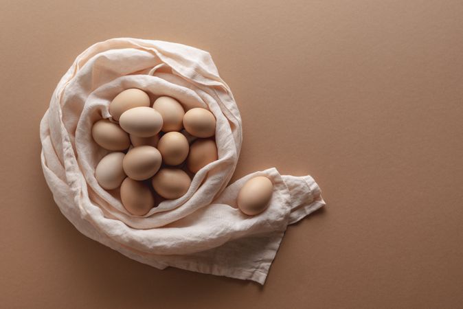 Brown eggs on brown background