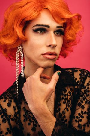Close-up portrait of drag queen looking away