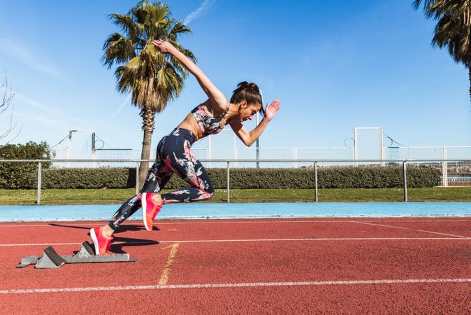 woman running on track