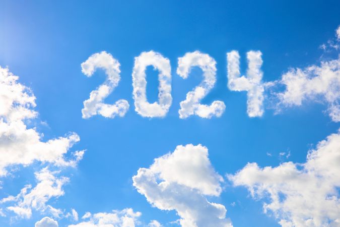 2024 year written on a blue sky of clouds.