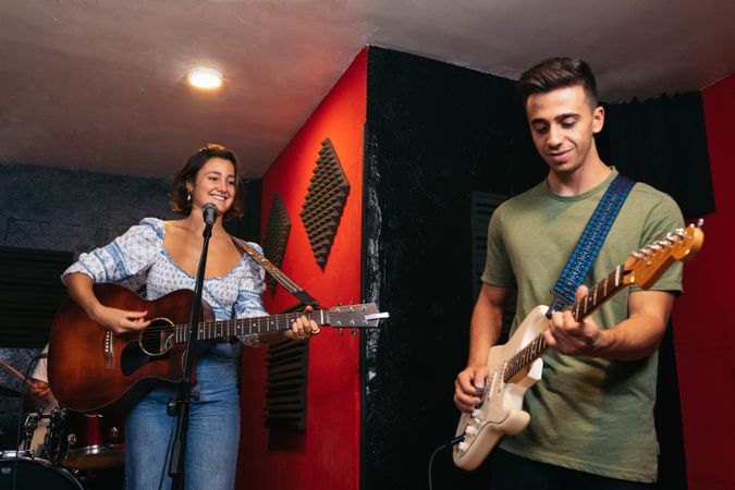 Music band rehearsing in a music venue