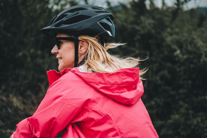 Smiling female riding bicycle