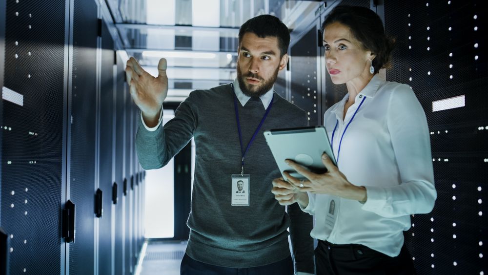 Two IT Engineers in Data Center