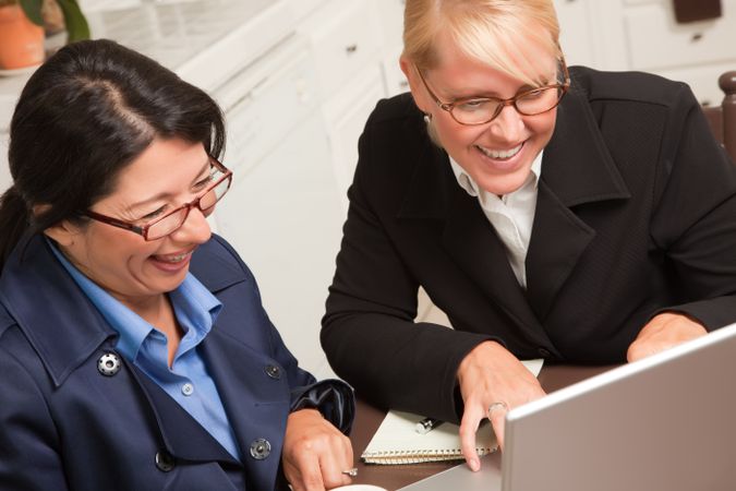 Business Colleagues Working on the Laptop