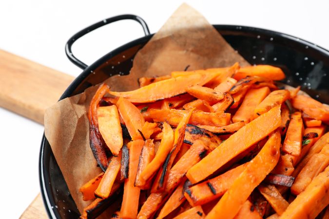 Concept of tasty food, fried sweet potato, close up