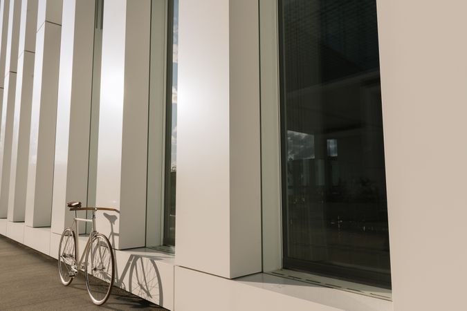 Bicycle parked outside modern building