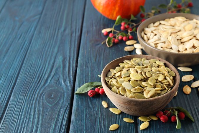 Concept of Autumn vibe food, Pumpkin, Pumpkin seeds, space for text