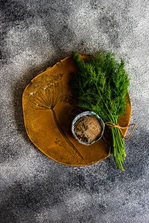 Cooking concept with fresh dill on a plate 