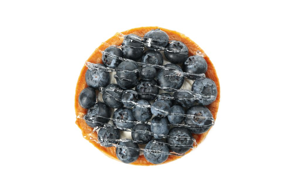 Tasty blueberry pie isolated on light background