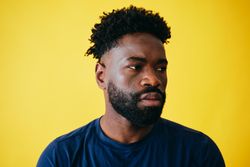 Portrait of serious Black man looking to the side