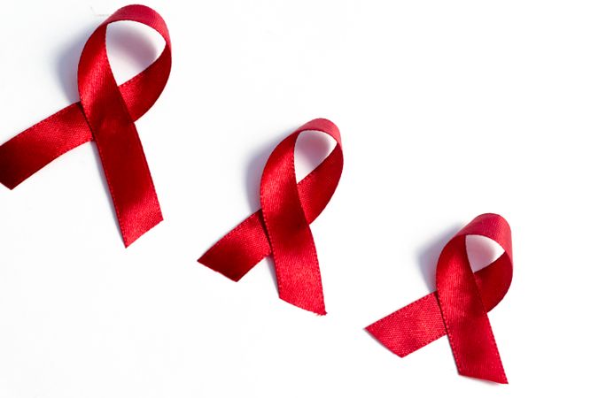 Red ribbons, HIV awareness concept, world AIDS day, world hypertension day, world cancer day with copy space