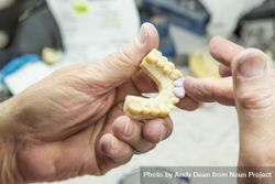 Dental Technician Working On 3D Printed Mold For Tooth Implants 4BanxX