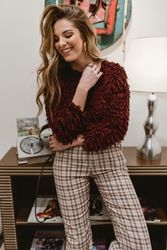 Cheerful woman in stylish room