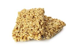 Tasty peanut brittles isolated on light background