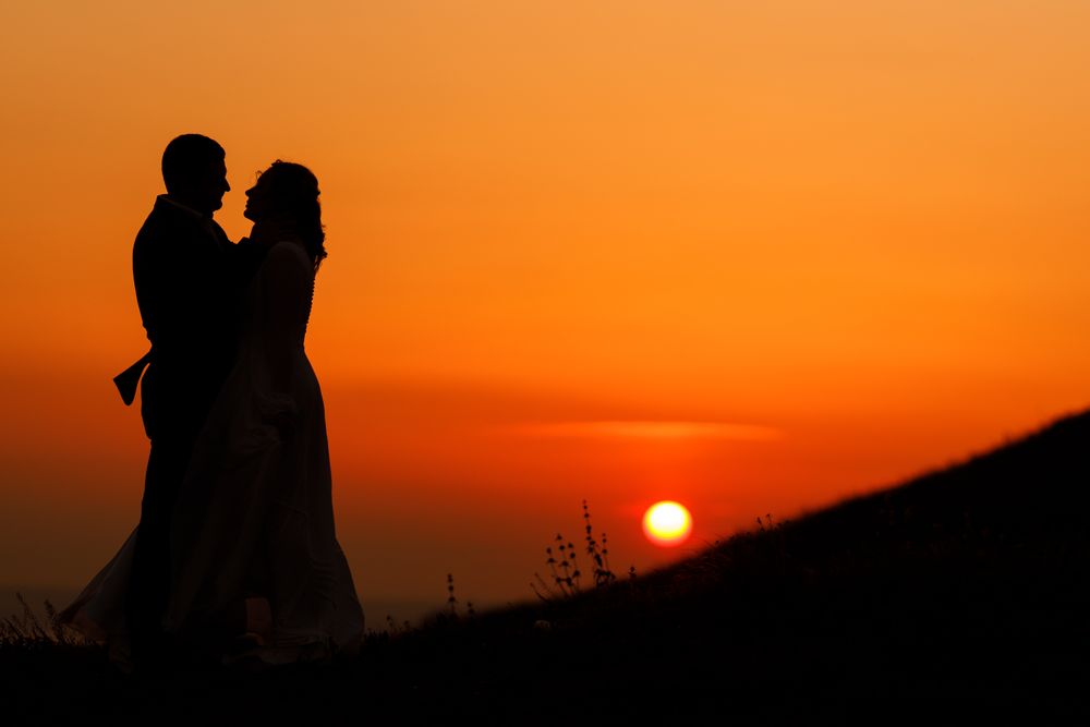 Bride And Groom In Love Sunset