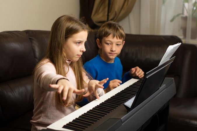 Siblings' Piano Practice Time