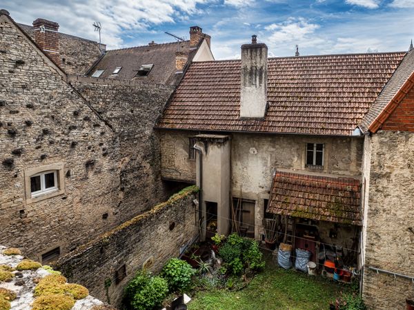 Empty streets of the medieval city of Beaune in Burgundy. The stormy sky