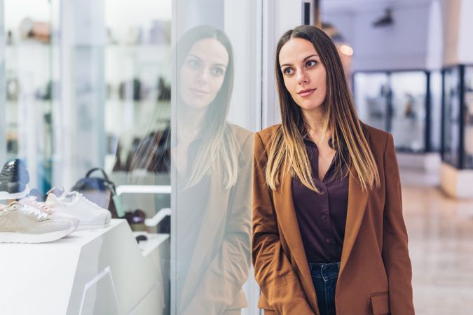 Fashionable female in trendy wear at mall