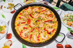 Traditional spanish paella cooked in a pan