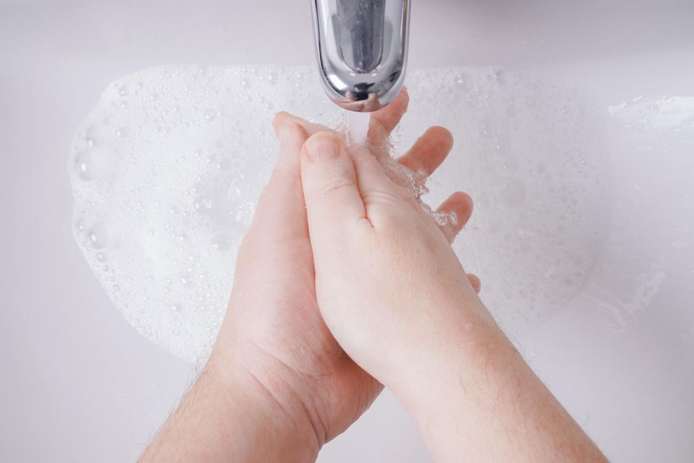 Person washing their hands