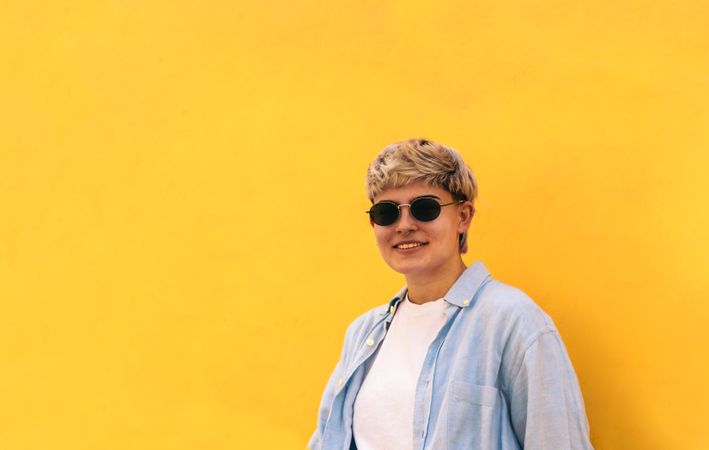 stylish young woman with short hair smiling. portrait