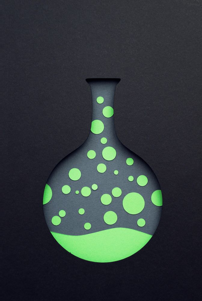 Paper cut out of chemistry beaker