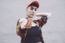 Woman in red cap suggesting to join