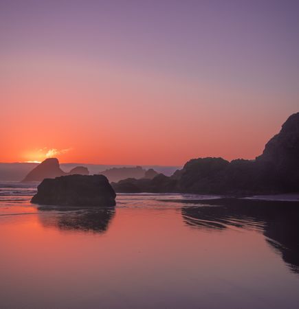 Calm pool of water under dusk in the pacific north west