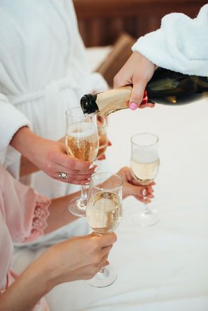 People drinking champagne at a party