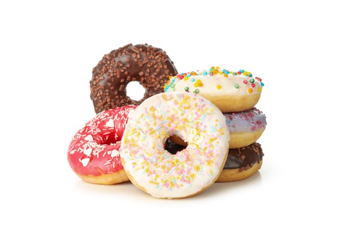 Tasty baked donuts isolated on plain background