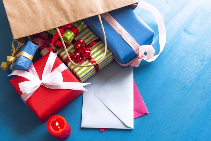 Shopping bag filled with gifts