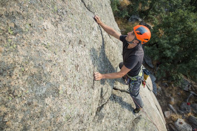 Man climbing a rock