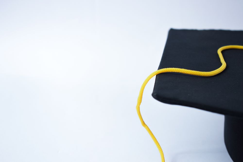 Graduation cap in studio shoot with copy space