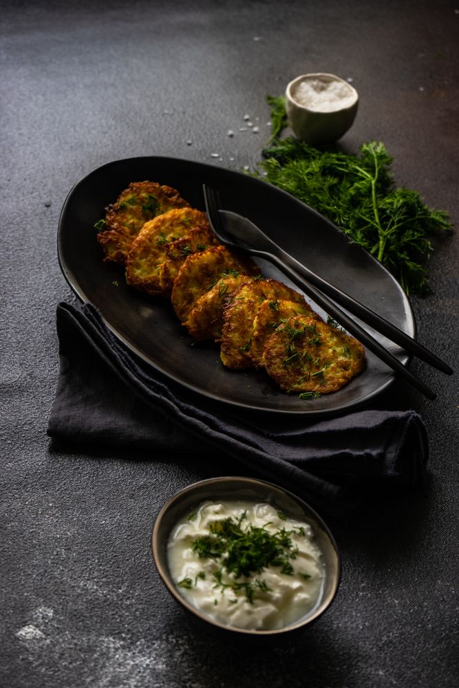 Traditional Ukrainian dish deruny served with dill garnish