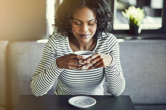 Woman relaxing with a nice cup of coffee