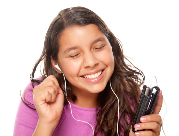 Pretty Hispanic Girl Listening to Music