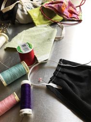 Close-up of homemade face mask sewing thread and fabric