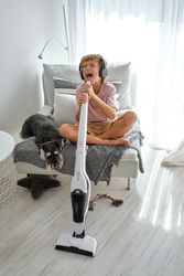 Boy singing while doing household routine