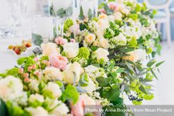 Wedding floral arrangement in long row beXXal