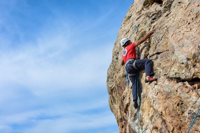 Man climbing rock mountain