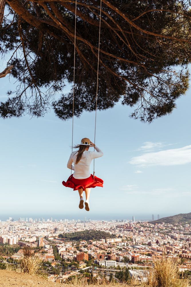 Woman having fun on a swing