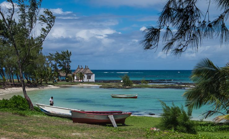Beautiful lagoon in the Indian Ocean with boats and hut