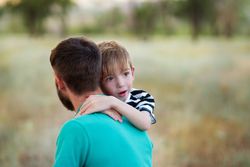 Affectionate father with son outdoor
