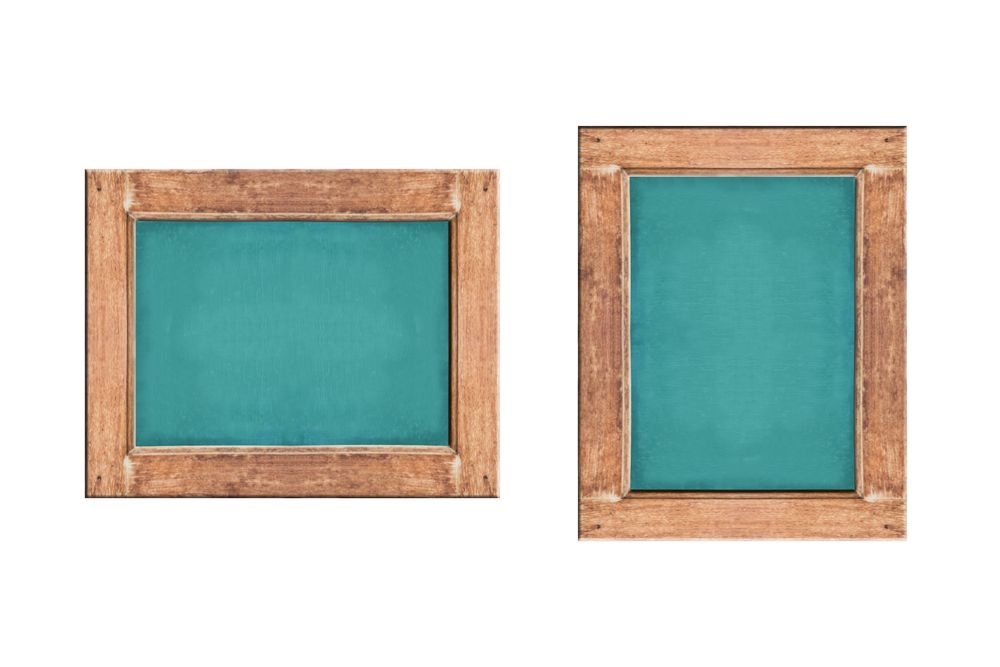 Empty green chalkboard with wooden frame