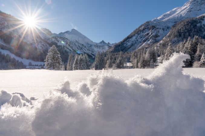 Deep snow scenery on a sunny day in December in the Bavarian Alps, Germany