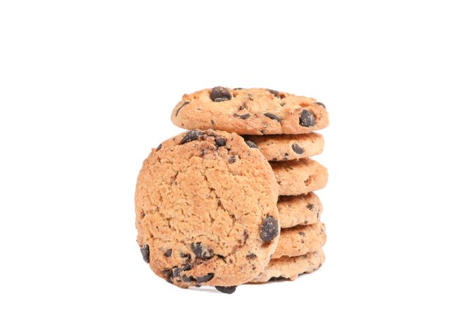 Stack of tasty chocolate chip cookies on blank background