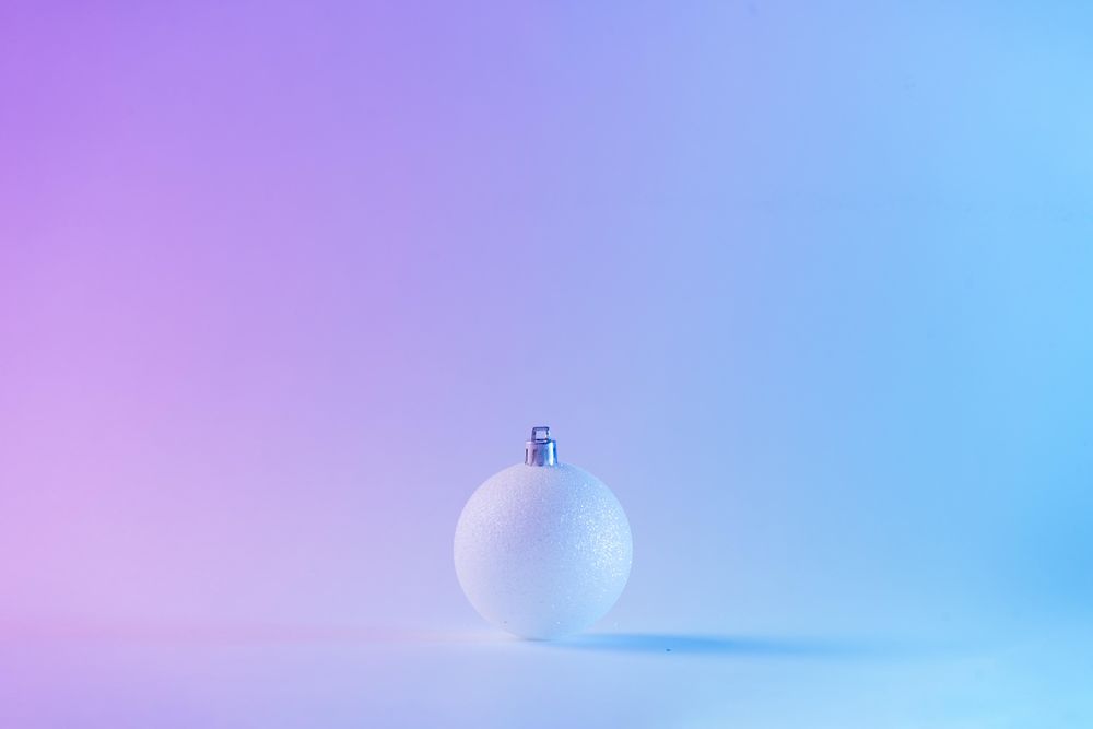 Bauble decorations on vibrant bold gradient holographic colors