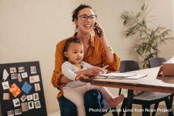 Working mom handling her business from home 0yPBqb