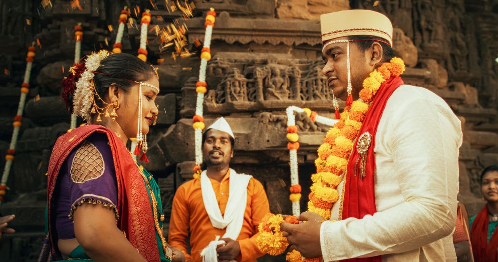 Portrait of an Extended Indian Family Taking a Photo on a Traditional Wedding.