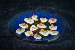 Scallop snacks served on plate